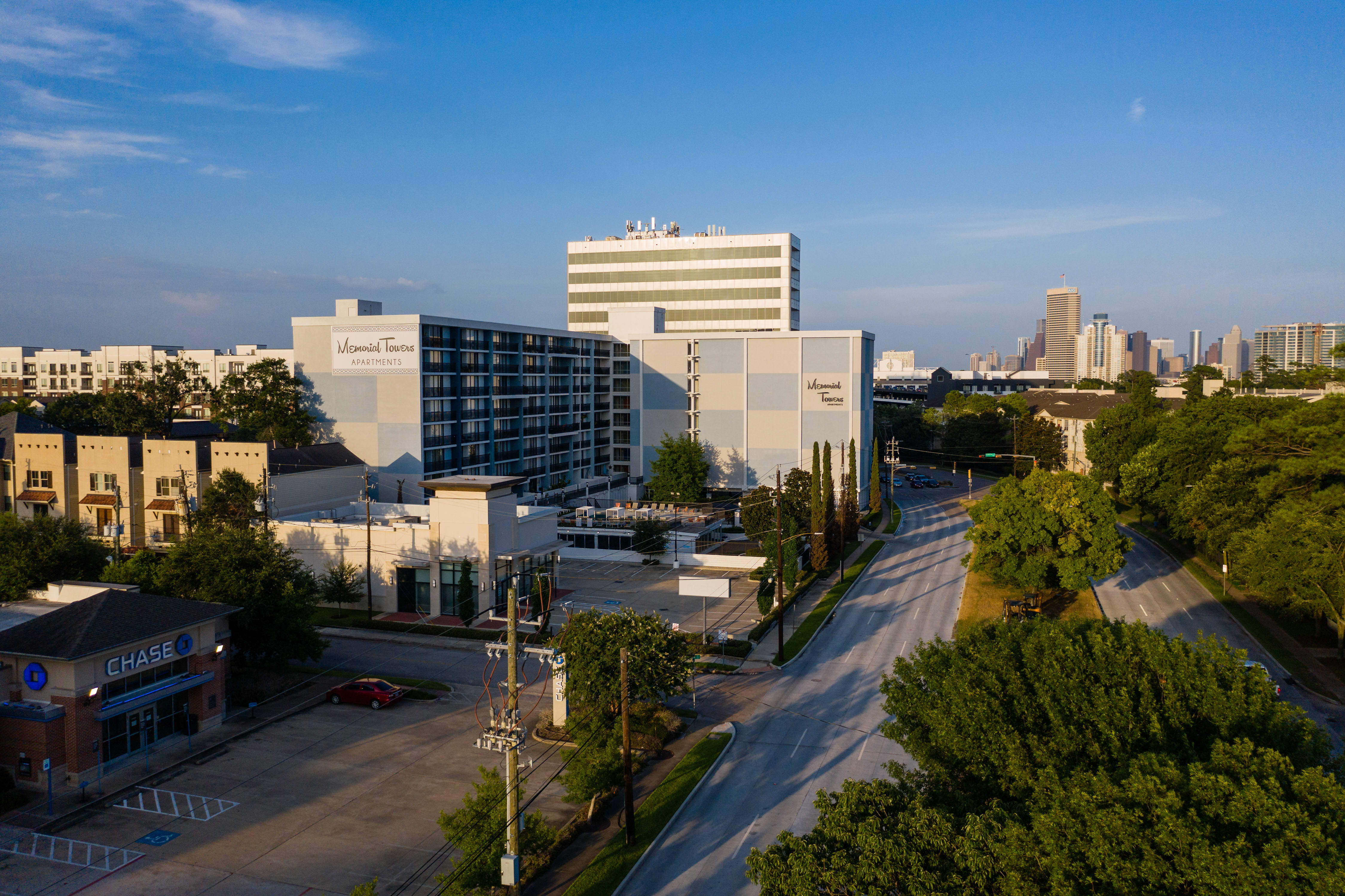 Memorial Towers aerial with downtown skyline